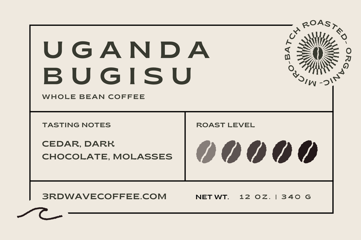 Uganda Bugisu coffee label with tasting notes and roast level indicators on a beige background.